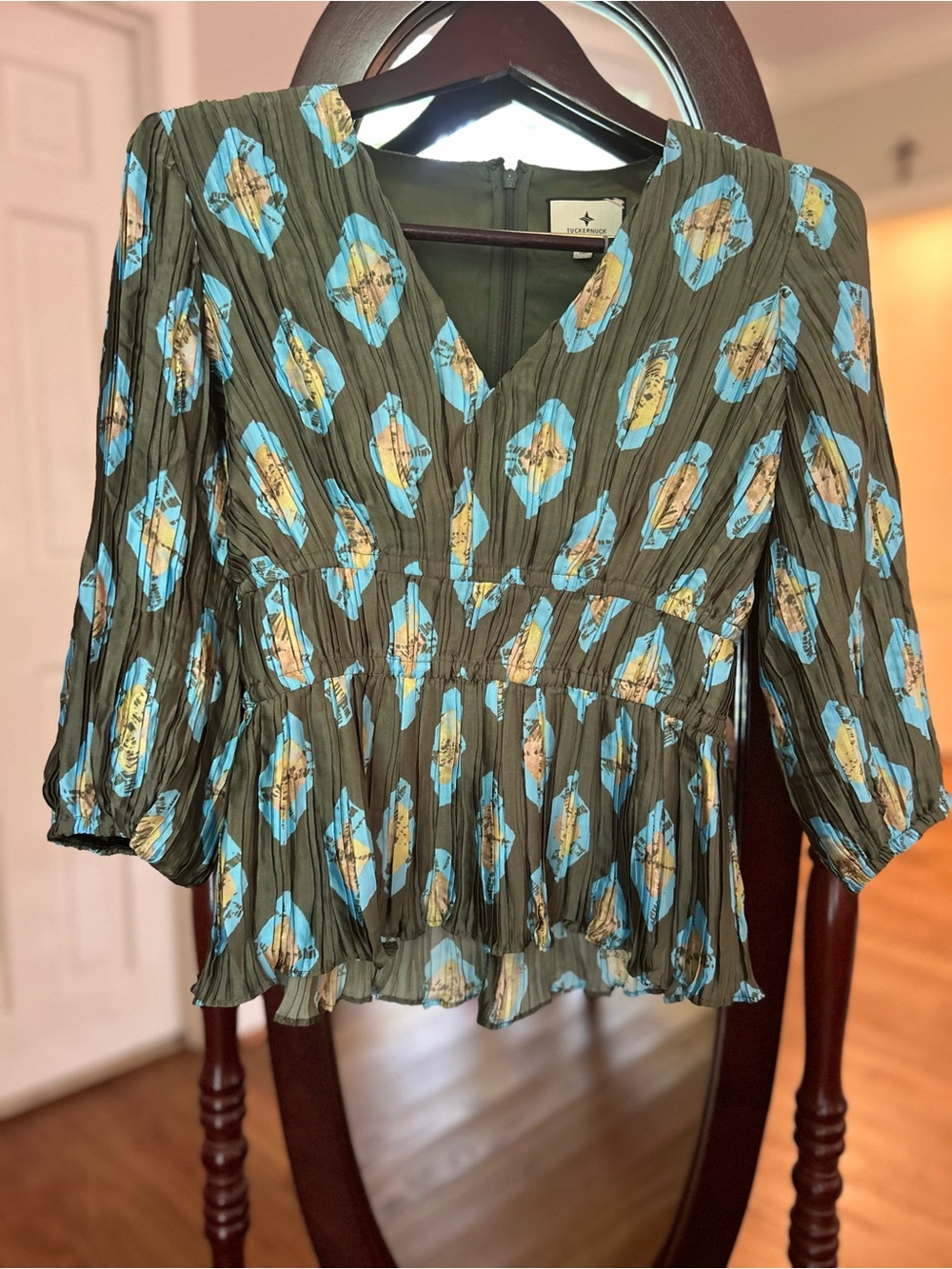 Tuckernuck Olive Green V-Neck Peplum Blouse with Blue and Yellow Medallion Print